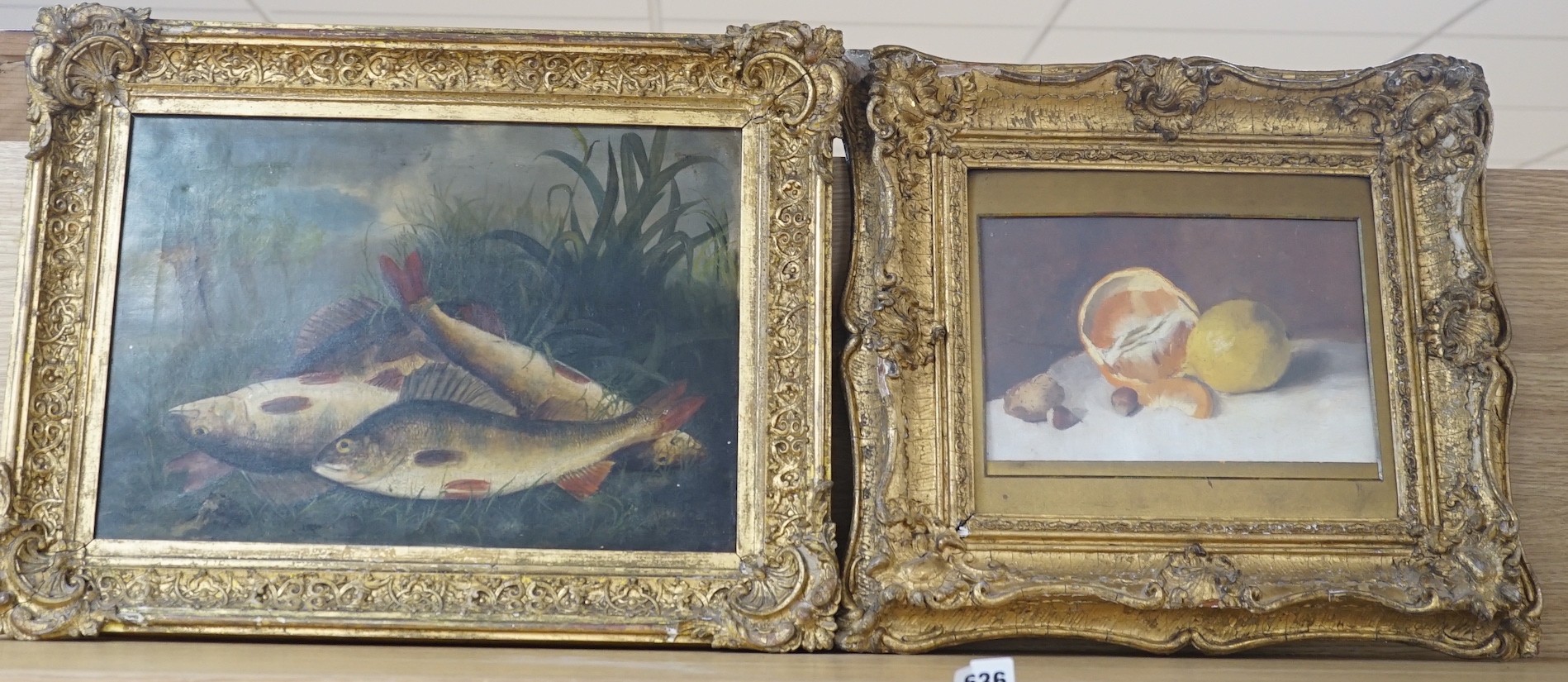 Victorian School, oil on canvas, Still life of fish upon a riverbank, 29 x 42cm, and a later oil sketch of fruit